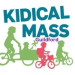 Kidical mass logo showing silhouettes of a person cycling a child in a cargo bike, and two children cycling independently